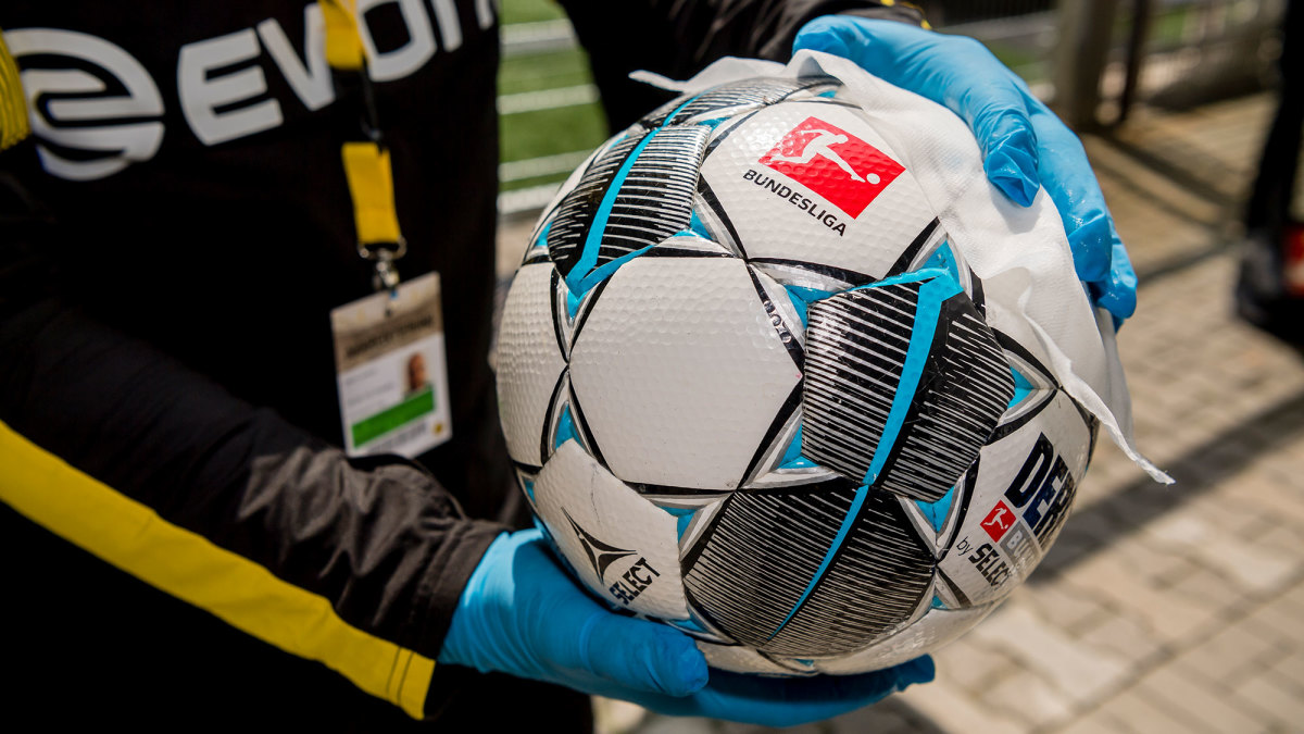 The game ball gets wiped before Dortmund vs. Schalke